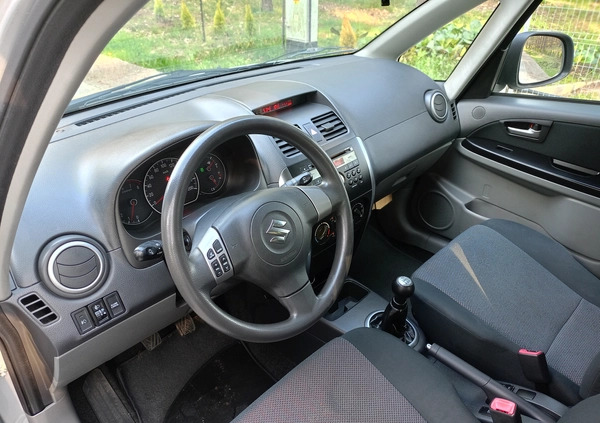 Suzuki SX4 cena 26990 przebieg: 170000, rok produkcji 2009 z Stepnica małe 379